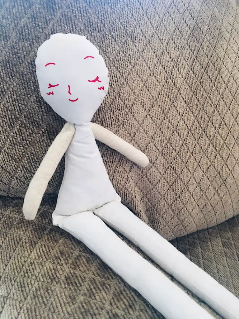 cloth doll sitting
