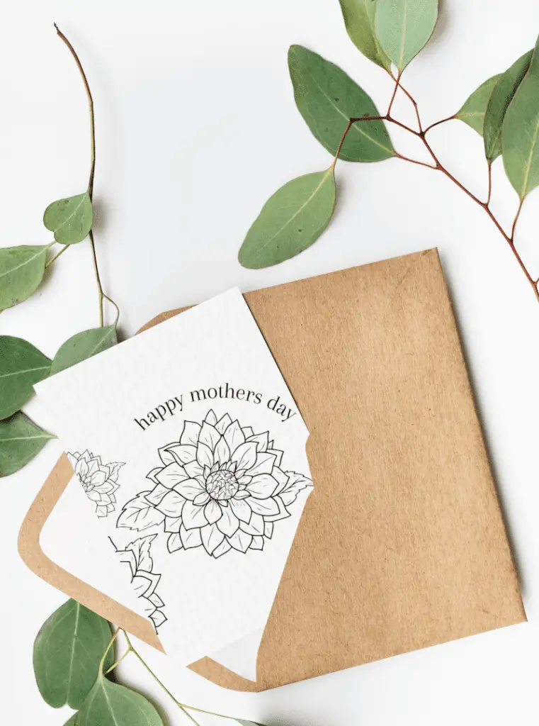 printable mothers day card and brown envelope on table with leaves