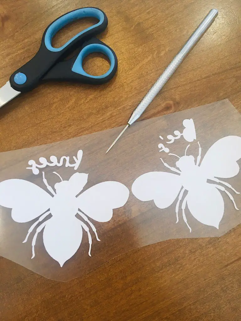 weeding the bee design from vinyl