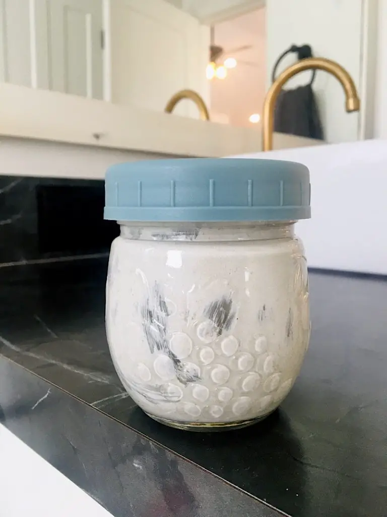 cloth diapers diaper rash cream in mason jar on counter