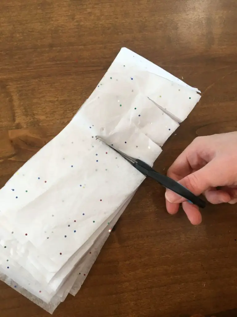 cutting tissue paper for unicorn pinata fur
