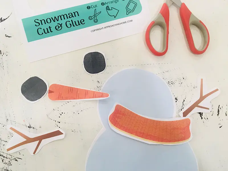 cut our pieces of snowman cut and glue