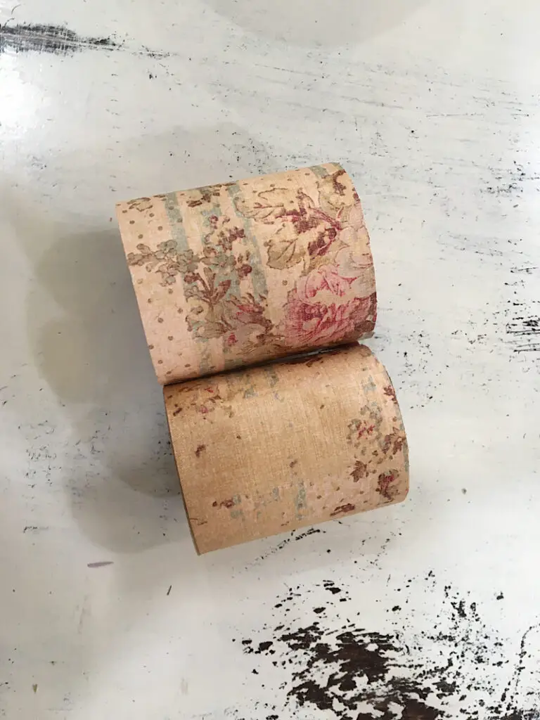 toilet paper tubes cut in half and wrapped with paper