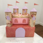 Valentines Day Card Box that looks like a pink princess castle with towers and flags a draw bridge and windows