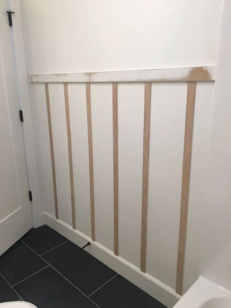 trim attached to wall bathroom