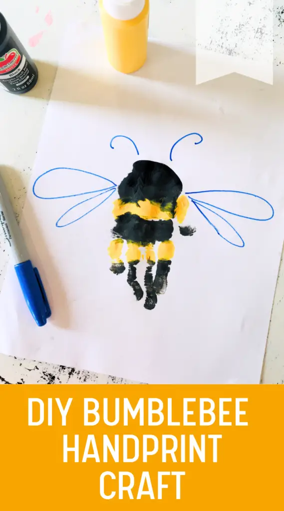 diy bumblebee handprint craft on paper with paints and paintbrushes