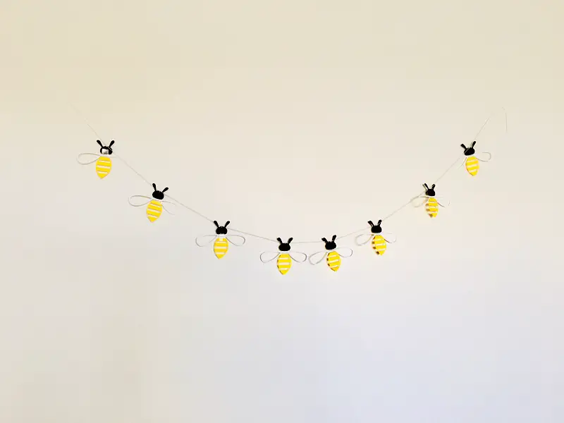 Honey bee garland hanging on a wall